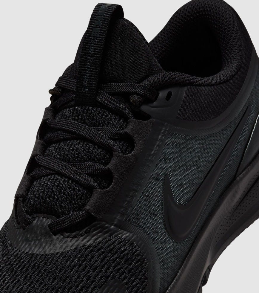 kids black nike runners