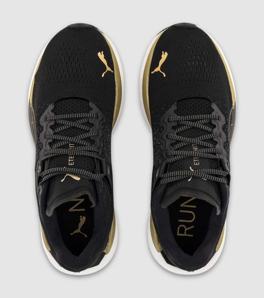 PUMA ETERNITY NITRO WOMENS PUMA BLACK PUMA TEAM GOLD The Athlete s Foot