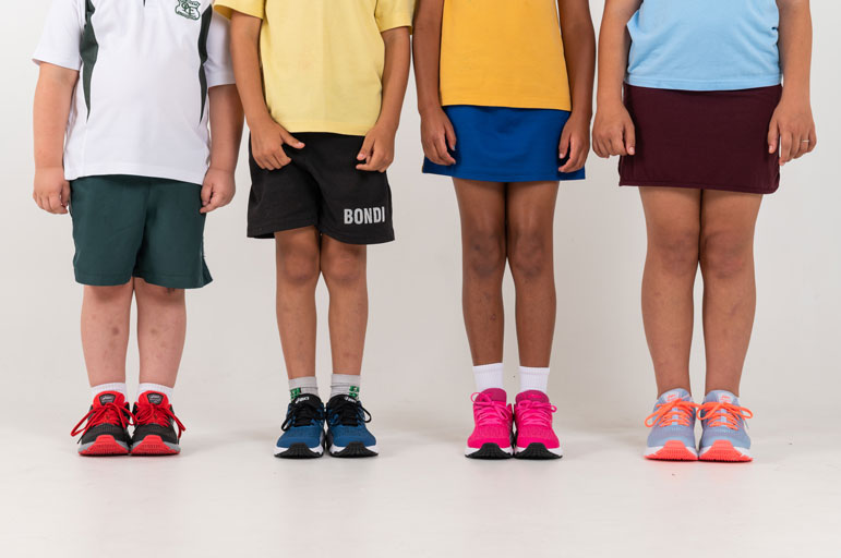 Different types of shoes used in school sports