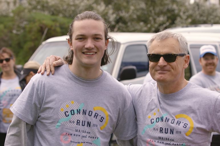 two men smiling