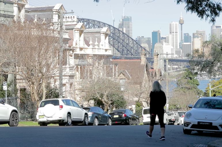 women crossing the street, Sydney harbor in background>
<p> </p>
<p> </p>
<p><em><strong>“I’ve always turned to fitness to help me get through times.”</strong></em></p>
<p>Tracy is a big believer that being active is actually a very powerful tool to help with mental health. However, like many of us, she hasn’t always found it easy to fit it in with her life. Not only because her busy schedule meant she <em>couldn’t, </em>but because she felt as though she <em>shouldn’t</em>,</p>
<p>“<em>Taking time for myself, I felt guilty. Because as a mother, a wife or someone with a job, there’s </em><em>always something to do,</em>” Tracy reflects, “<em>but as soon as I switched that thought of exercise </em><em>being something I have to do to be healthy, to it being something that I choose to do to have </em><em>time on my own and it’s also going to benefit me, I felt a lot better about working out.”</em></p>
<p> </p>
<img style=