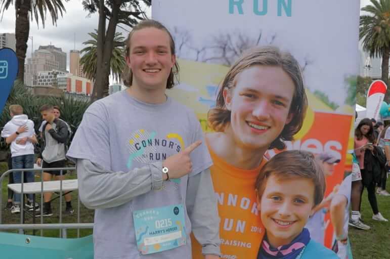 young man outside, at charity run